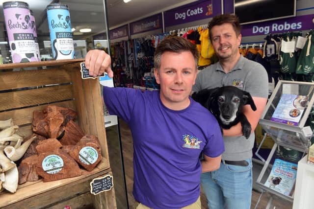 Woofs N Scruffs owners Mark (left) and David Potts-Brown with dog Halle.