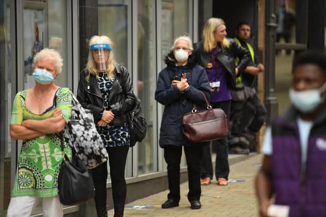 Face masks must not be worn by babies or very young children Public Health England has warned. Photo by OLI SCARFF/AFP via Getty Images.