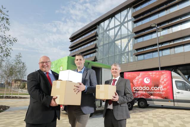 Sunderland City Council leader Councillor Graeme Miller, Ian Pattle, general manager - customer service and strategy at Ocado, and Patrick Melia, the council's chief executive, pictured as Ocado moved in to The Beam.