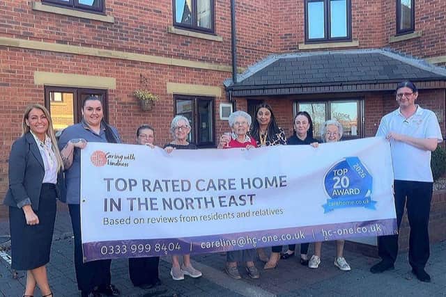 The team at Ashbourne Lodge Care Home celebrating their Top 20 Carehome.co.uk success