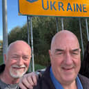 Kate Snowdon is pictured on her arrival in Ukraine with her dad Tom (left) and family friend Phil Billingham.