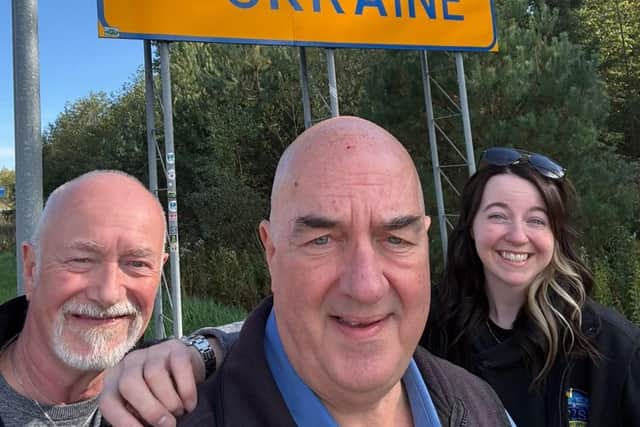 Kate Snowdon is pictured on her arrival in Ukraine with her dad Tom (left) and family friend Phil Billingham.