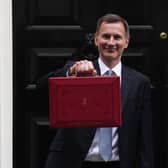 Chancellor Jeremy Hunt leaves Downing Street with the despatch box to present his spring budget