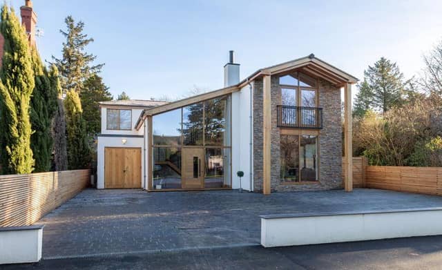 The contemporary house has been built around an original 1970s' design.