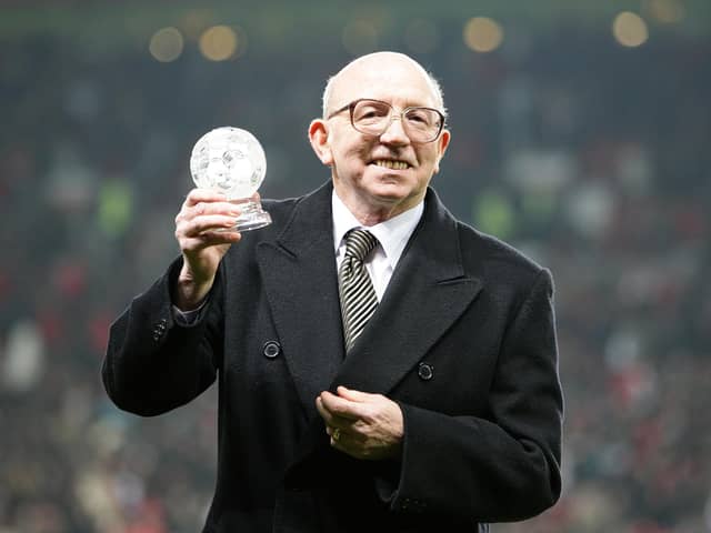 1966 World Cup winner Nobby Stiles is presented with an award on the pitch prior to kick off.