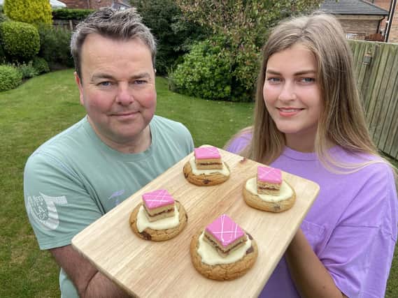Kieron Donoghue with his daughter Macy and a selection of their Pink Slice cookies. Picture by FRANK REID