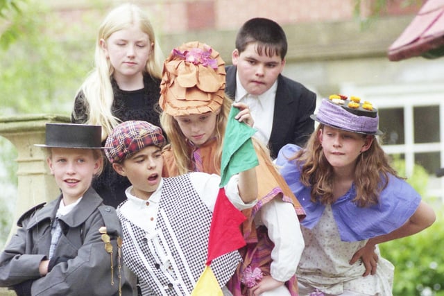 Pupils from Grange Park Primary School, were pictured getting ready for their production of Oliver. Pictured are Carra Dennis as the Artful Dodger, centre. Fagin was played by Sarah Ogelby, watched by Kate Dixon as Widow Corney, Sean Dunn as Mr Bumble, Katie Sanderson as Nancy and Shareen Mitchell as Bet.