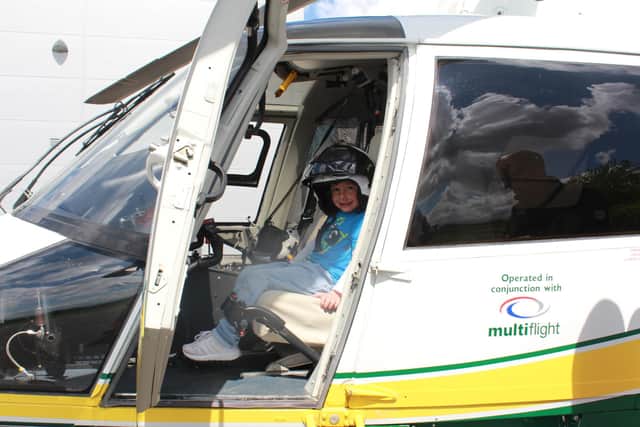 Isaac Hoey sat in a GNAAS helicopter