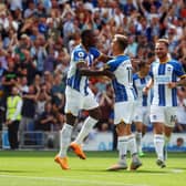 Moises Caicedo of Brighton & Hove Albion celebrates with Leandro Trossard after scoring their sides second goal during the Premier League match between Brighton & Hove Albion and Leicester City at American Express Community Stadium on September 04, 2022 in Brighton, England. (Photo by Bryn Lennon/Getty Images)