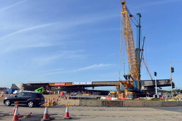 This was the scene last September, as work was ongoing to place the new bridge into position over the roundabout.
