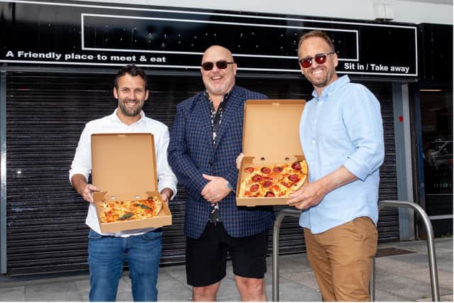 Slice owners Mark Milroy, left, and Andy Smith, right, with Cllr Graeme Miller, centre.