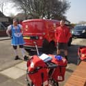 Jon Matson, left, has been bringing a smile while out on his rounds for Royal Mail.