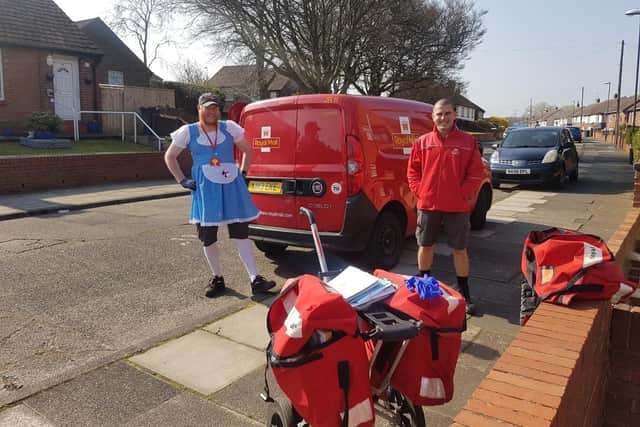 Jon Matson, left, has been bringing a smile while out on his rounds for Royal Mail.