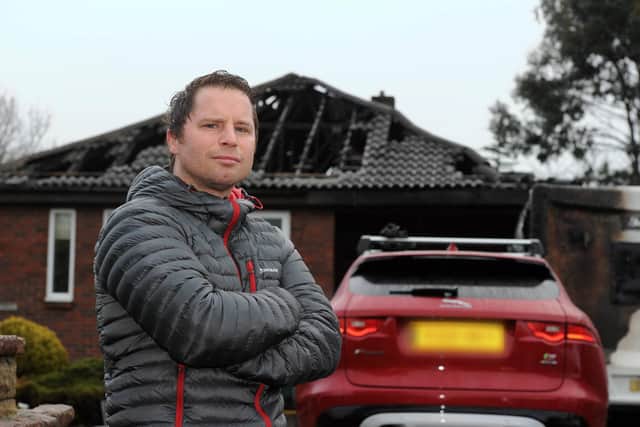 Sean Ivey outside his home in Wingate which was destroyed in two arson attacks