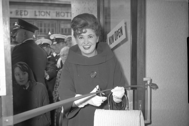 Pat Pheonix, who played Elsie Tanner in Coronation Street, opened March the tailors in June 1962.