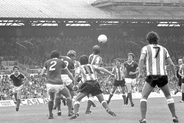 Sam Allardyce (in background) during match with Everton at Roker Park