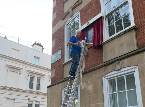 Trevor Ramsay from Sunderland, completing the installation of the Princess Diana blue plaque which has now been unveiled in London.