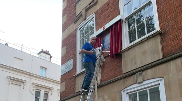Trevor Ramsay from Sunderland, completing the installation of the Princess Diana blue plaque which has now been unveiled in London.