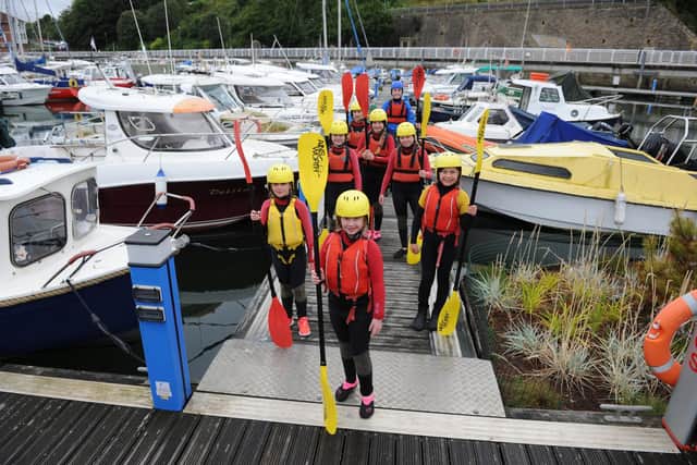Children at Adventure Sunderland getting ready to return the water for a kayaking session at the marina.