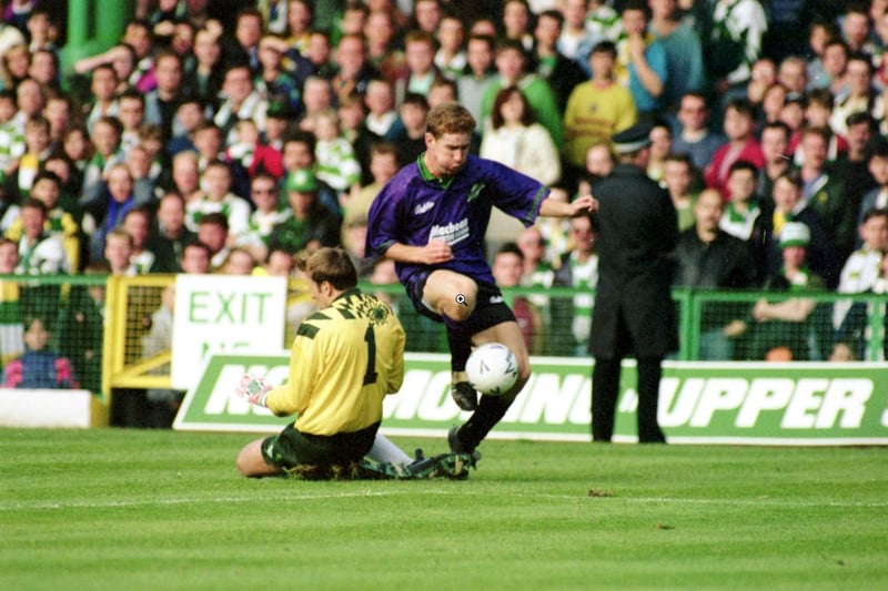 Keith Wright evades Gordon Marshall during a 3-2 win over Celtic at Parkhead in September 1992