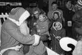 Which stocking fillers do you remember most fondly from your childhood? Youngsters are pictured here meeting Santa Claus at Littlewoods, Sunderland, in December 1983. Santa with children outside Littlewoods in December 1983.