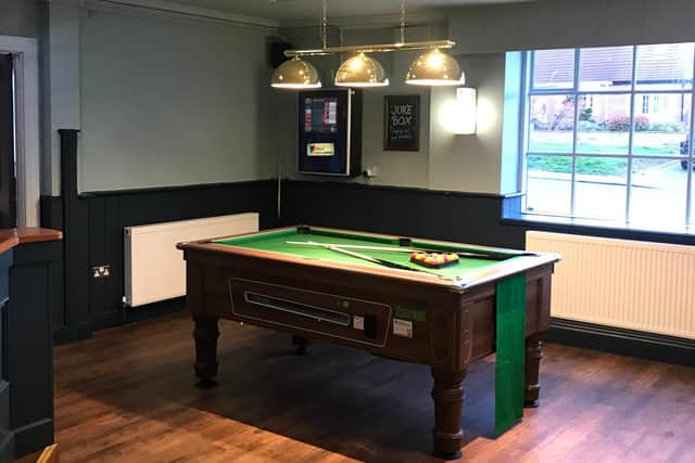 Customers can enjoy a game of pool at the newly refurbished Black Bush pub.