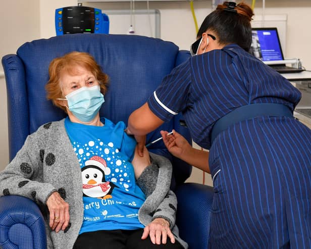 Margaret Keenan, 90, is the first patient in the United Kingdom to receive the Pfizer/BioNtech covid-19 vaccine at University Hospital, Coventry, administered by nurse May Parsons, at the start of the largest ever immunisation programme in the UK's history.