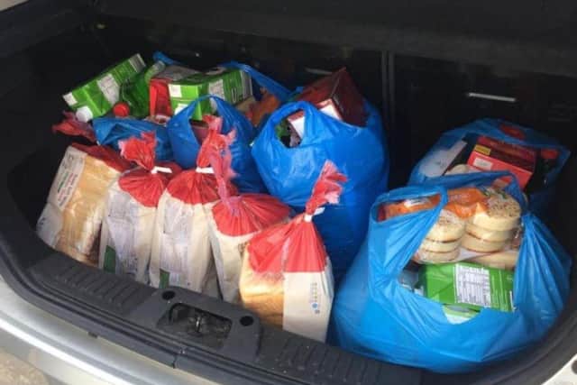 Abbi Langdon and boyfriend Rhys Deehan delivered 100 food packages to the vulnerable in their surrounding area