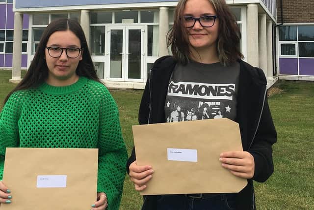 Monkwearmouth Academy pupils Hannah Dorgan, 16, and Jenna Scuffham, 16, with their GCSE results.