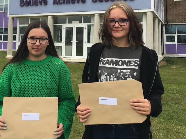 Monkwearmouth Academy pupils Hannah Dorgan, 16, and Jenna Scuffham, 16, with their GCSE results.