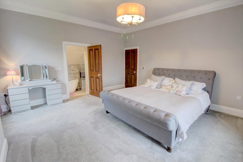 The master bedroom is a substantially sized double and boasts large coving and a high ceiling giving character to the room. Two huge sash windows give inviting views of the open countryside.