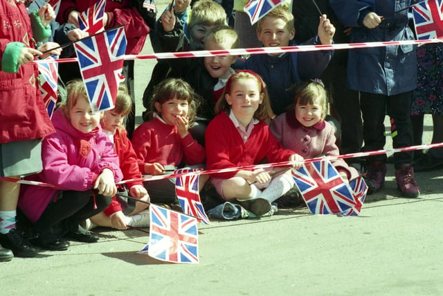 A school day with a difference for these flag waving youngsters.