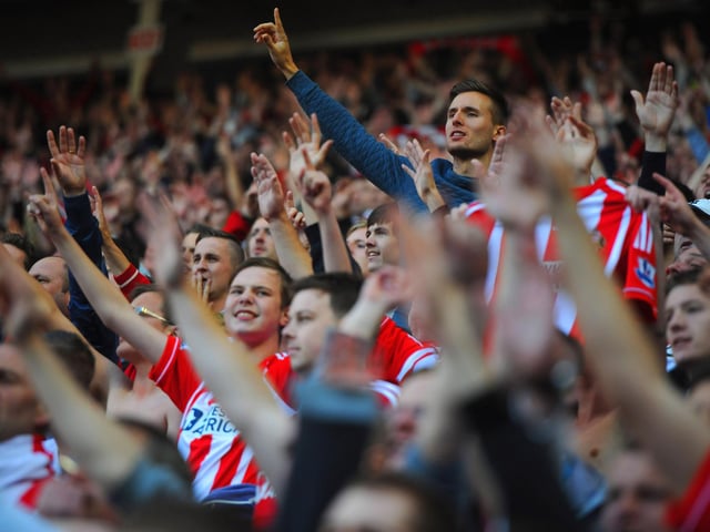 Sunderland fans cheer during the Premier League match between Sunderland and Newcastle United at the Stadium of Light on October 21, 2012.
