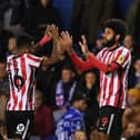 BIRMINGHAM, ENGLAND - NOVEMBER 11: Ellis Simms of Sunderland (R) celebrates with teammate Amad Diallo after scoring their side's first goal during the Sky Bet Championship between Birmingham City and Sunderland at St Andrews (stadium) on November 11, 2022 in Birmingham, England. (Photo by Tony Marshall/Getty Images)