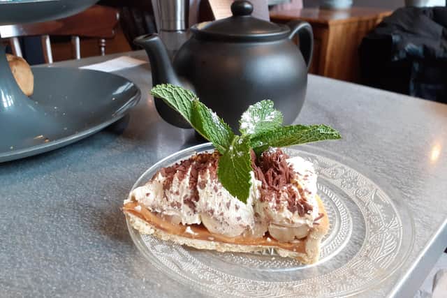 The banoffee pie had a light base topped with wedges of banana, caramel, whipped cream and chocolate flakes.