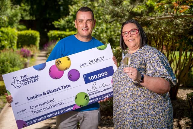 Louise and Stuart Tate celebrate winning £100,000 on a scratchcard