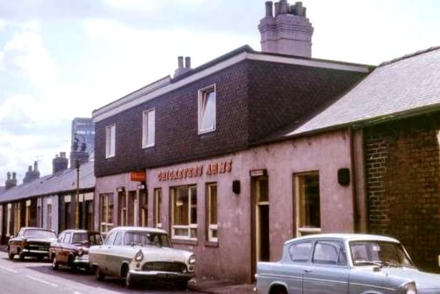 It's a real line-up of 60s motors outside the Cricketers in Pilgrim Street. Does this bring back happy memories? Photo: Ron Lawson.