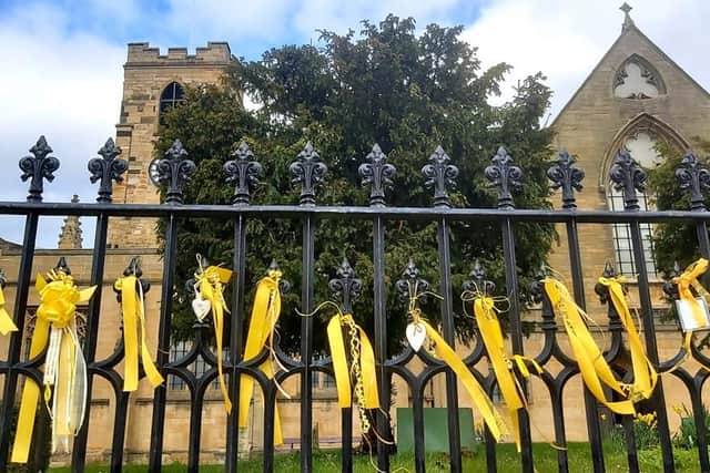 A photo shared by Rev Chris Howson of the display of ribbons attached to the railings around Sunderland Minster to mark a year on from the start of the Covid lockdowns.