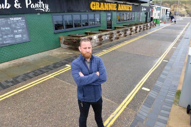 Grannie Annie's manager Adam Straughan is concerned over new double yellow parking measured outside the bar.