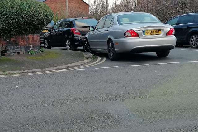 A frustrated motorist snapped this picture while out on the school run, with this driver happy to block the road junction to park up and be on their way.