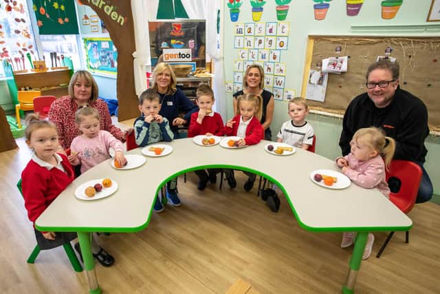 (left to right) Farringdon Academy headteacher Claire McDermott, Susie Thompson from Gentoo, Karen Eadington representing the Greggs Foundation, and Nigel Wilson, also from Gentoo, alongside Farringdon Academy pupils at the school's breakfast club.

Photograph: Gentoo