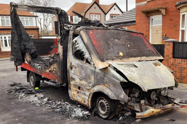 Two people were arrested on suspicion of arson after a this vehicle was set alight in the early hours of Good Friday.