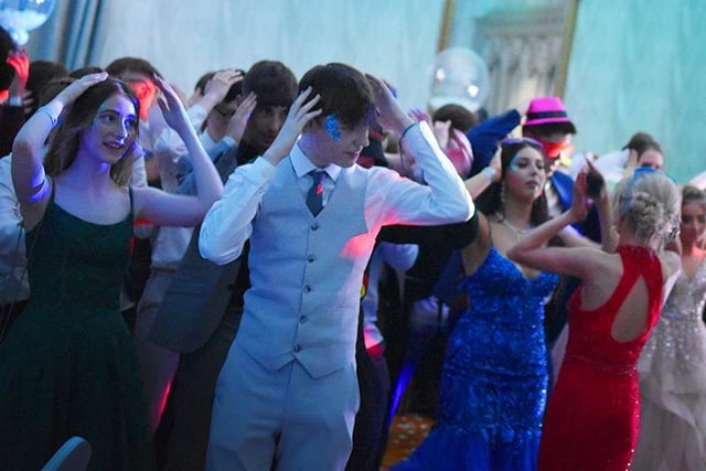 Pupils going through a dance routine.