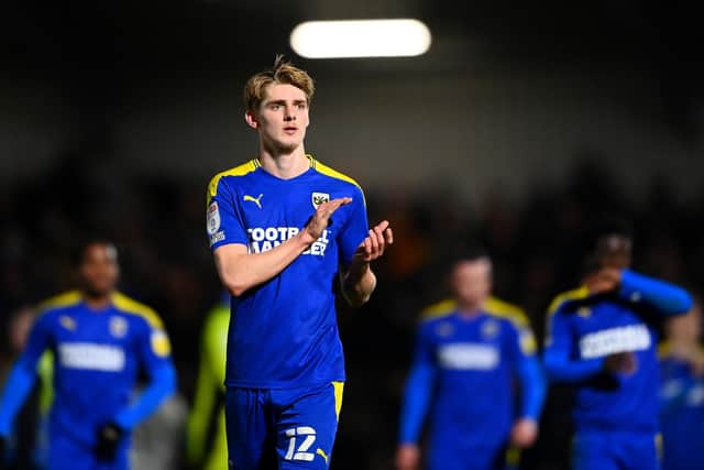 WIMBLEDON, ENGLAND - JANUARY 25: Jack Rudoni of AFC Wimbledon acknowledges the fans after the Sky Bet League One match between AFC Wimbledon and Ipswich Town at Plough Lane on January 25, 2022 in Wimbledon, England. (Photo by Alex Davidson/Getty Images)