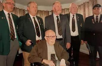DLI Association members stand behind Syd Elliott during a visit to his Sunderland care home in 2018 to mark his 100th birthday.