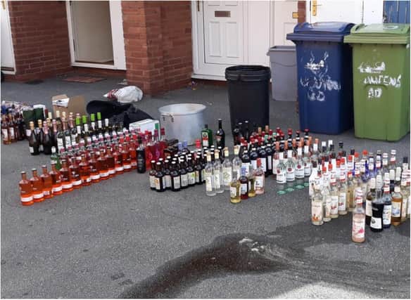 A total of £5,000 worth of alcohol was found in the wheelie bin.