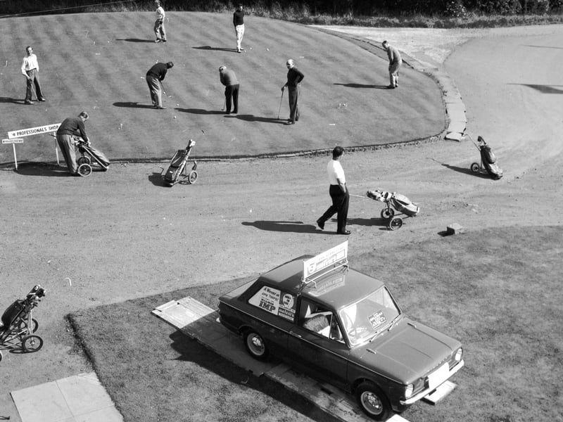 Golfers practice their putting at Drumpellier golf course at Coatbridge in September 1964. A Hillman Imp was the prize for a hole-in-one.