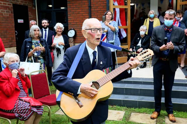 Len Gibson entertaining guests with songs he wrote when in Burma at the Daft as a Brush VJ Day commemorations in August 2020. Picture by Tony Iley
