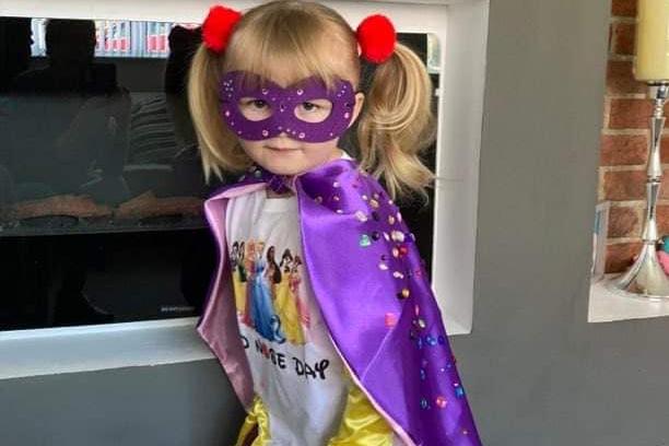 Ella, age 3, in her superhero outfit for Comic Relief.