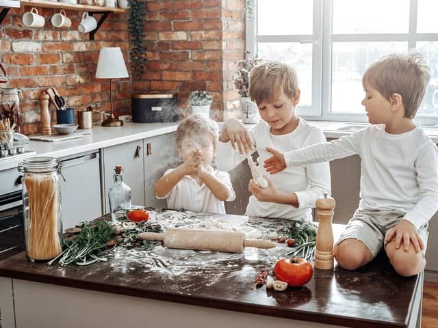 Children love getting involved in preparing food in the kitchen.